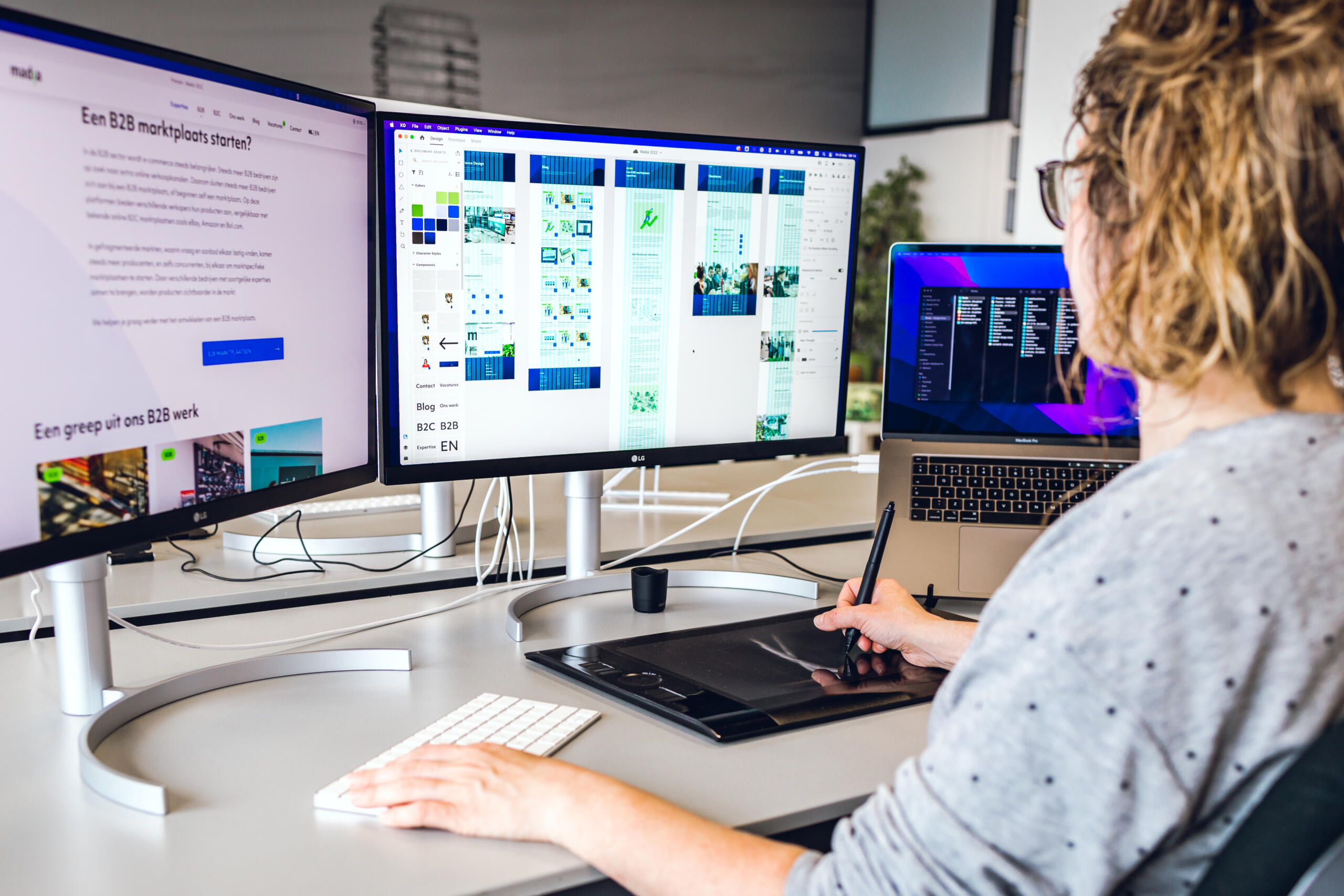 Bouke at work on her computer on a design